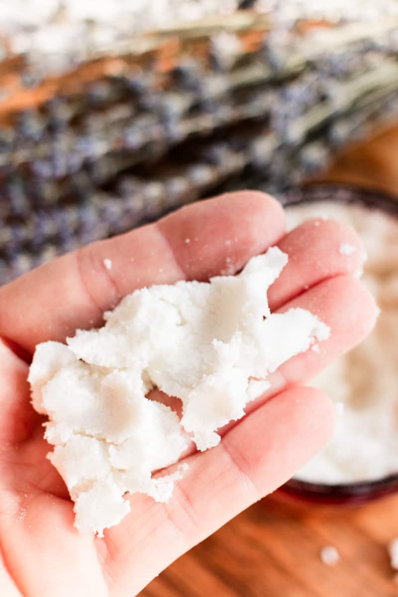 Adding coconut milk bath to the bath water.