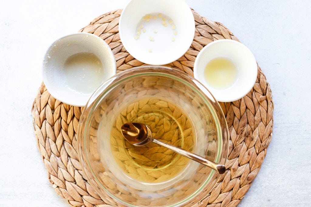 Stirring the melted tallow ingredients.