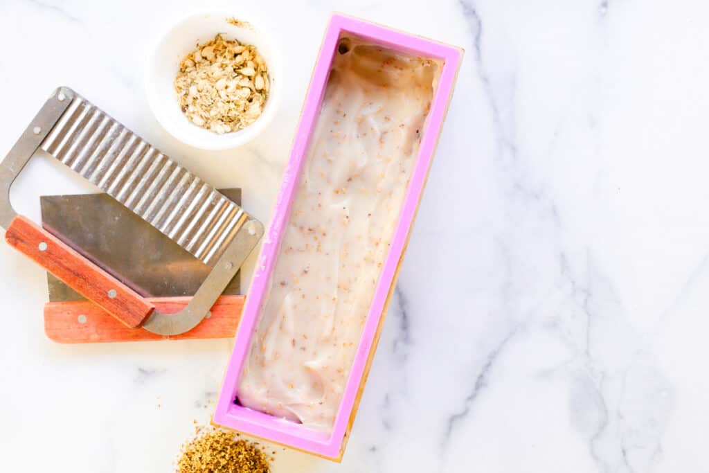 Allowing the soap bars to dry in a rectangle soap mold.