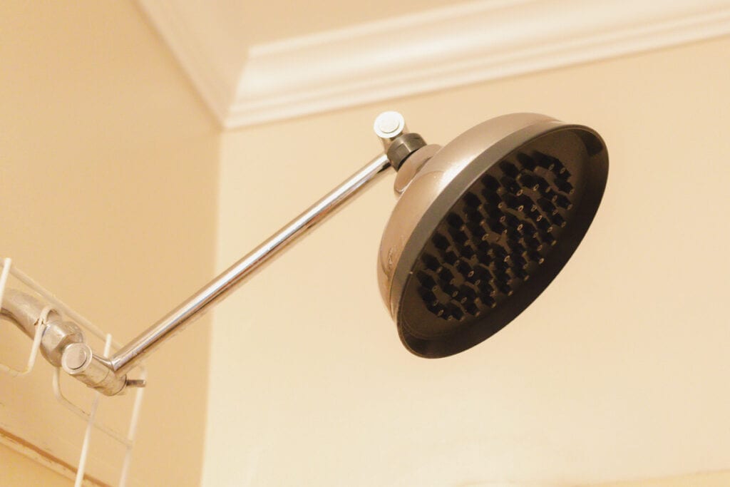 How to Easily Clean Calcium Buildup in Your Shower Our Oily House