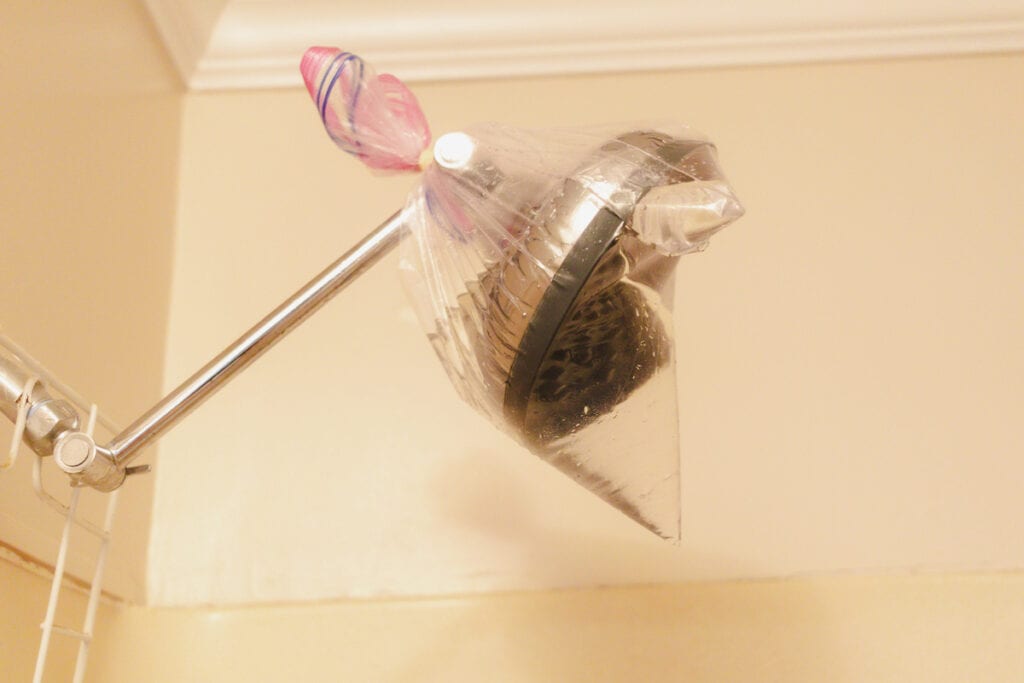 How to Easily Clean Calcium Buildup in Your Shower Our Oily House