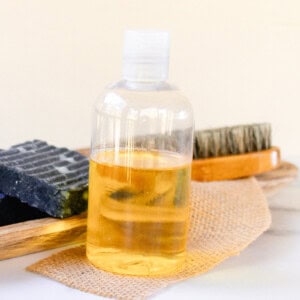 A pre shave oil made with fast absorbing oils on a small piece of burlap ready to apply to the beard.