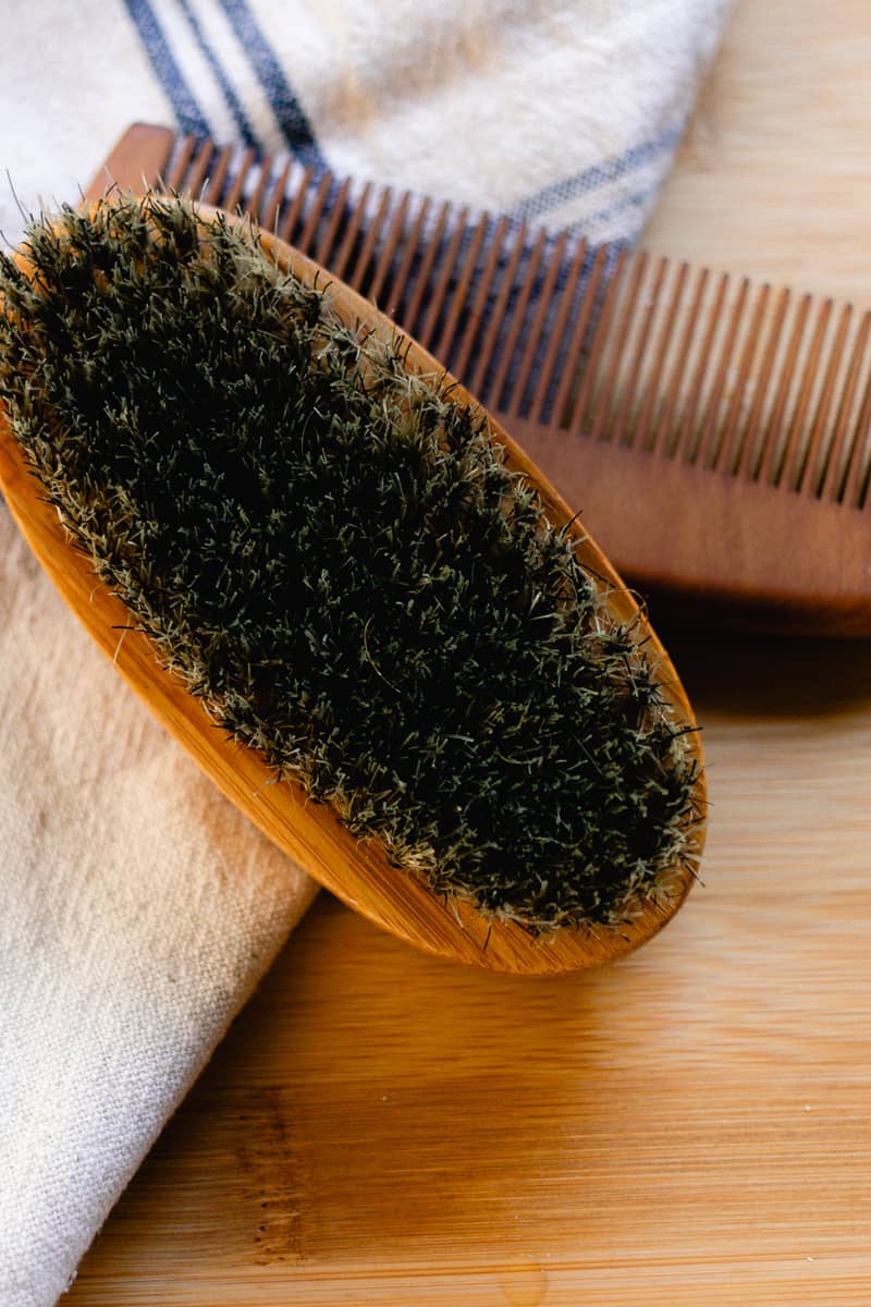 How do I clean my boar bristle brush?