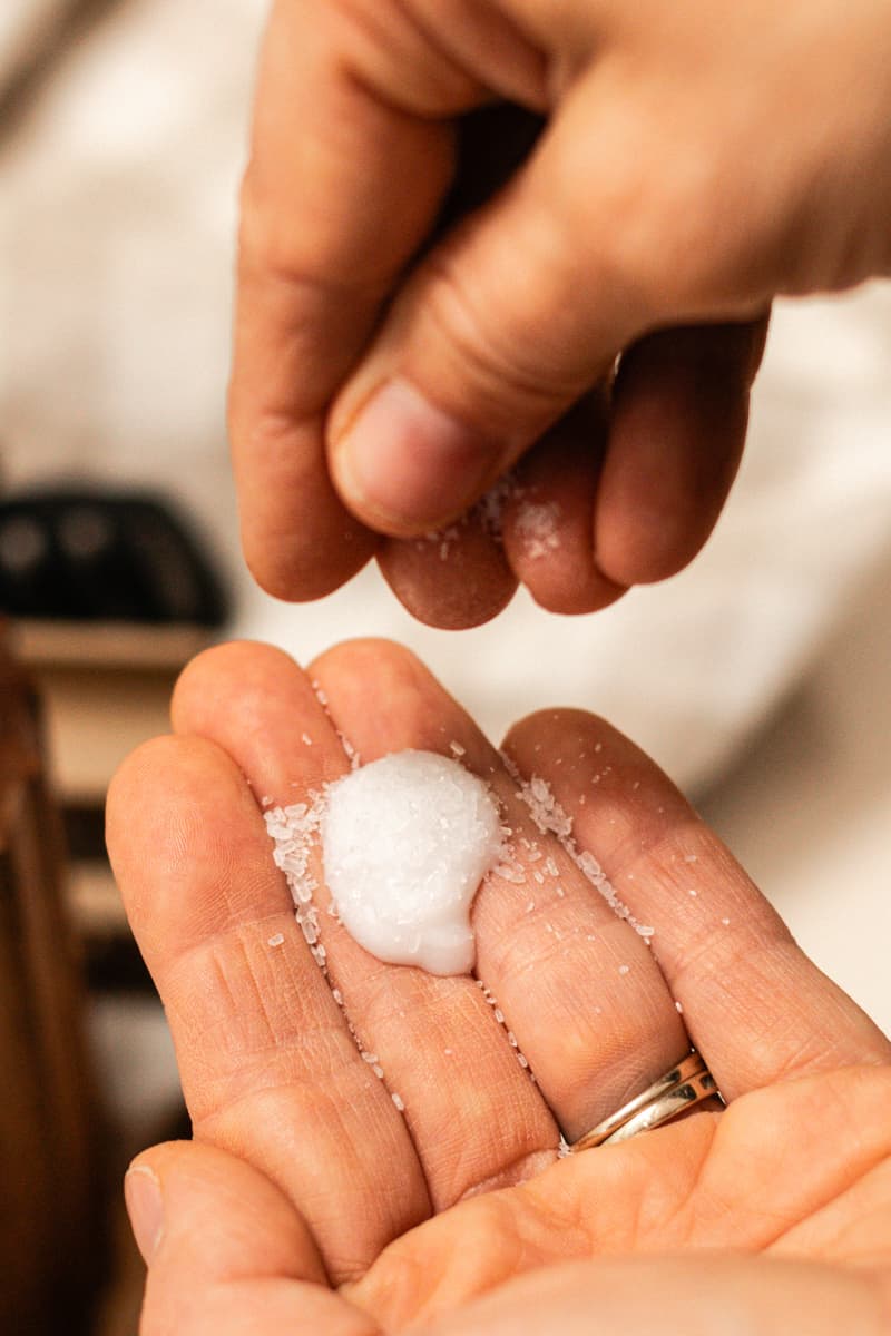 Mixing the epsom salt with the shampoo right in my hands.