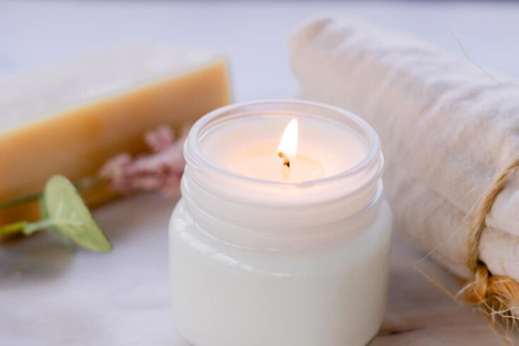 A burning soy wax candle.