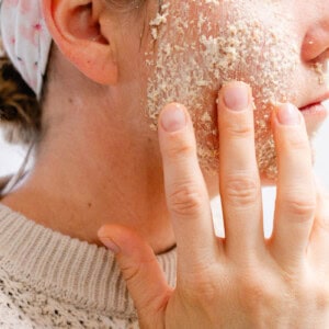 Applying oatmeal face mask to my face.