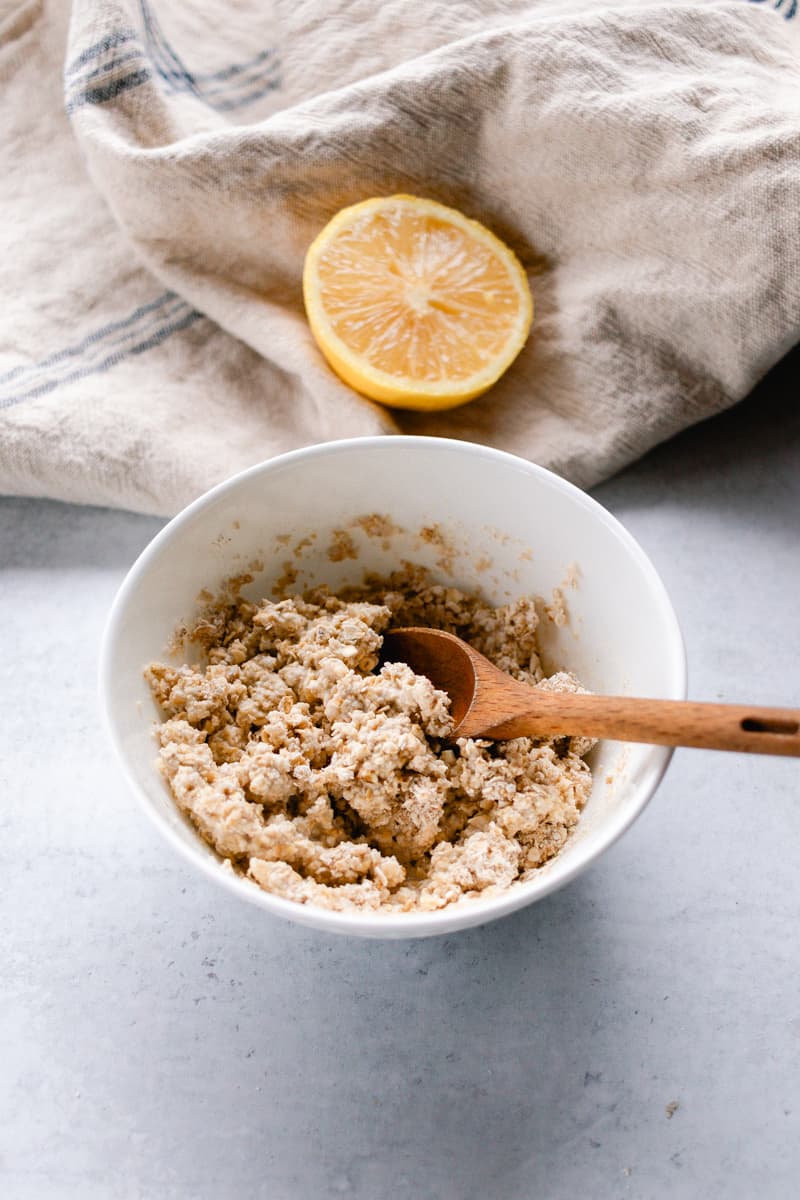 My oatmeal lemon face mask being scooped up to apply to my face.