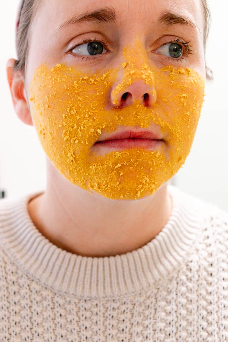 Letting the turmeric and colloidal oatmeal face mask soak into my skin before rinsing off.