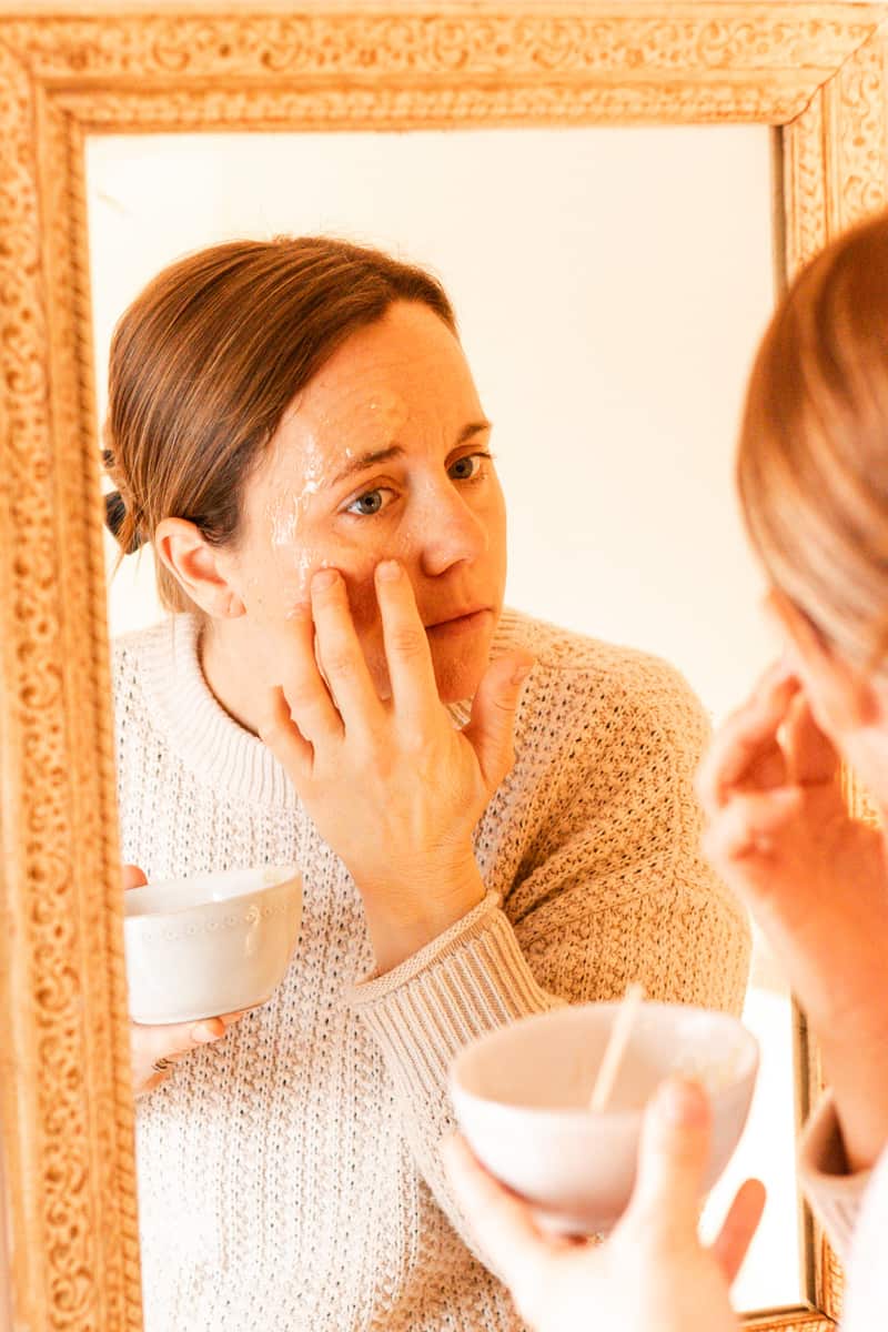 Applying the face mask with my fingertips.