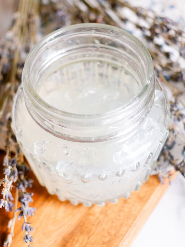 Homemade hair gel in a glass container.
