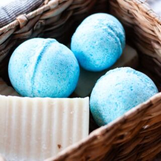 Blue shower bombs in a small basket.