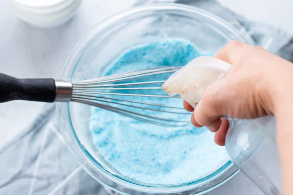 Spritzing the shower bombs with a bit of witch hazel.