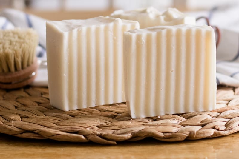 Hand cut shampoo bars curing on a drying pad.