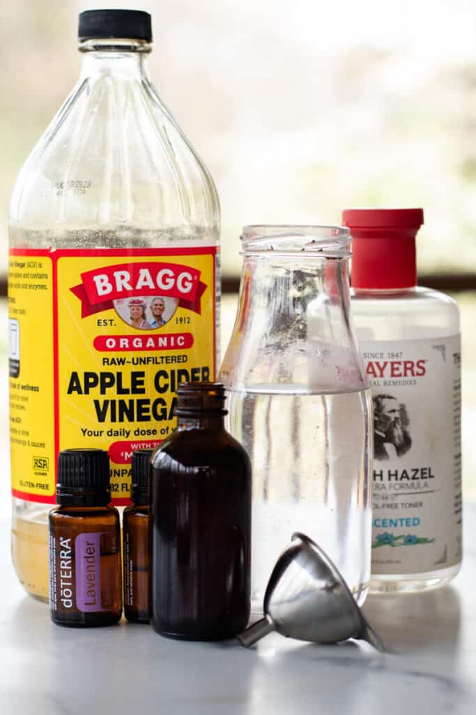 All the ingredients for the toner laid out along with the storage bottle and a funnel.