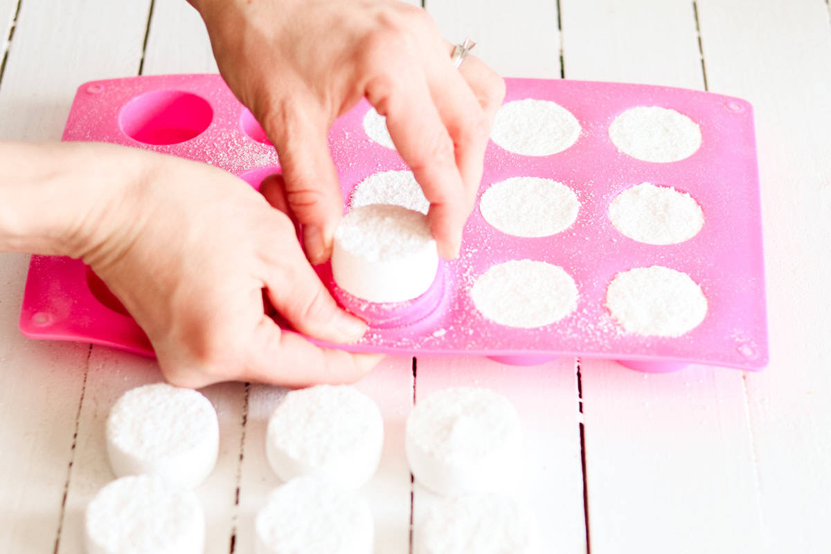 Popping the dried tabs out of the molds with my fingers. 