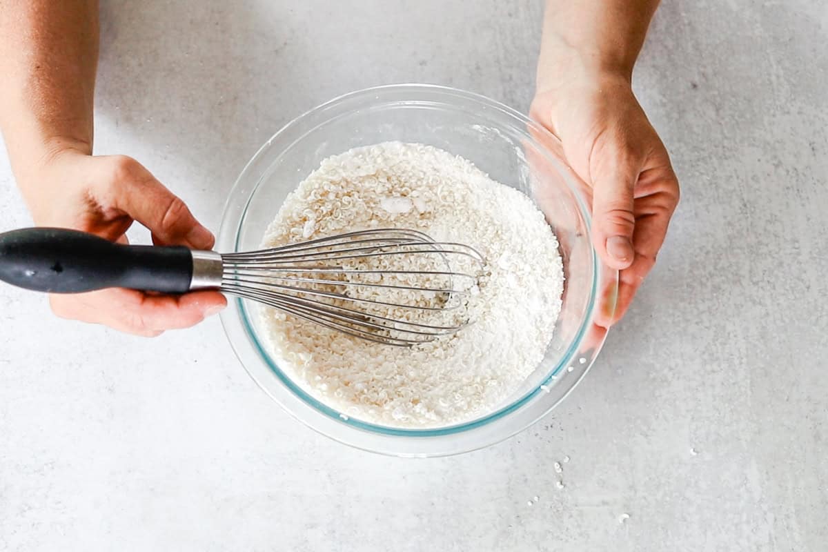 Whisking the dry ingredients together with the vinegar.
