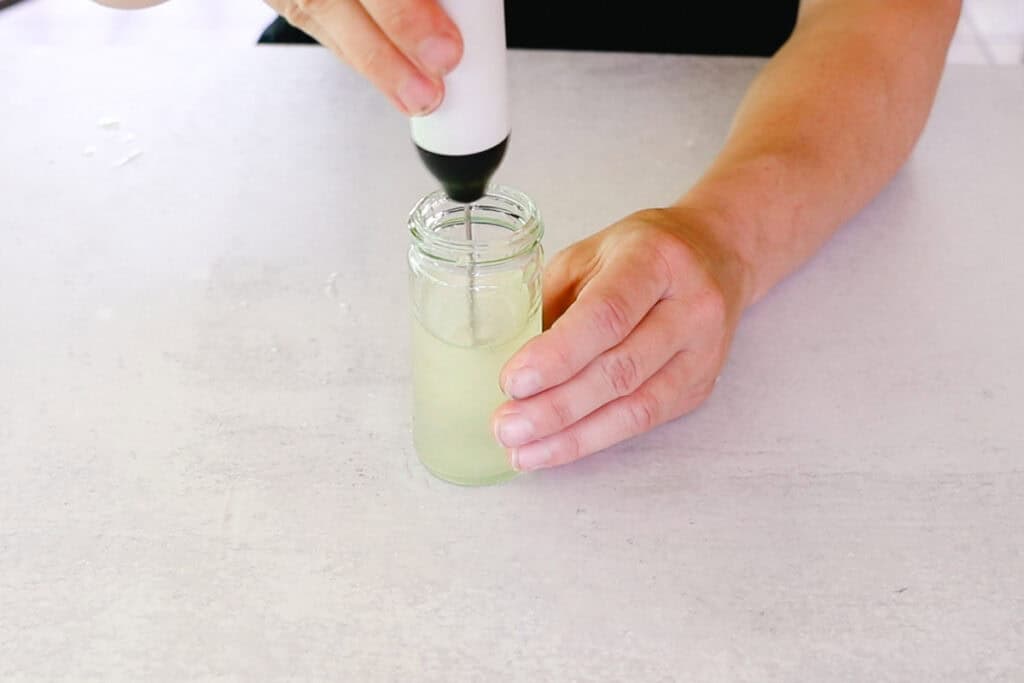Mixing the eye serum with a high speed mixer.
