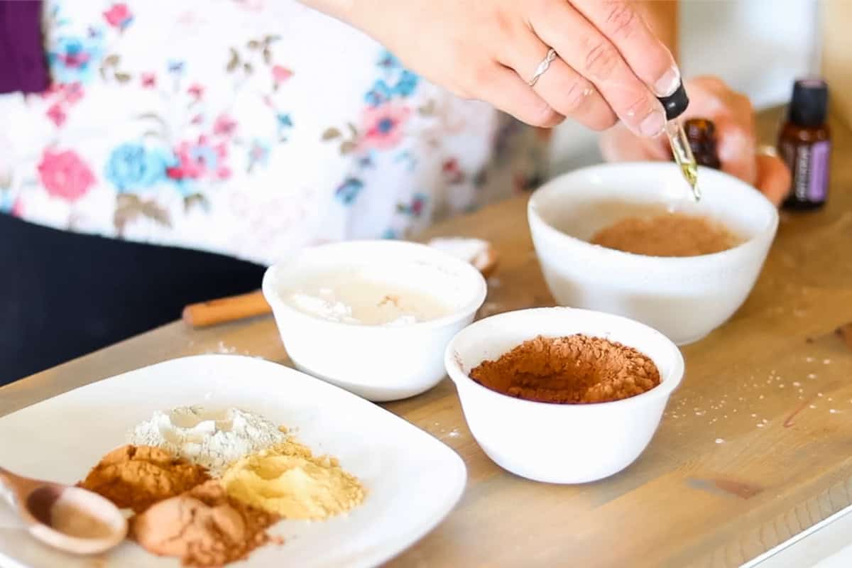 Adding oil to a DIY foundation mixture.