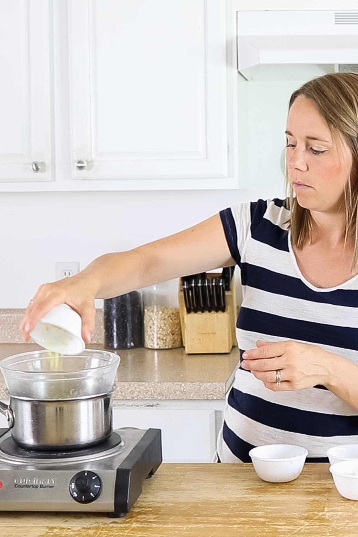 Melting ingredients over a double boiler.