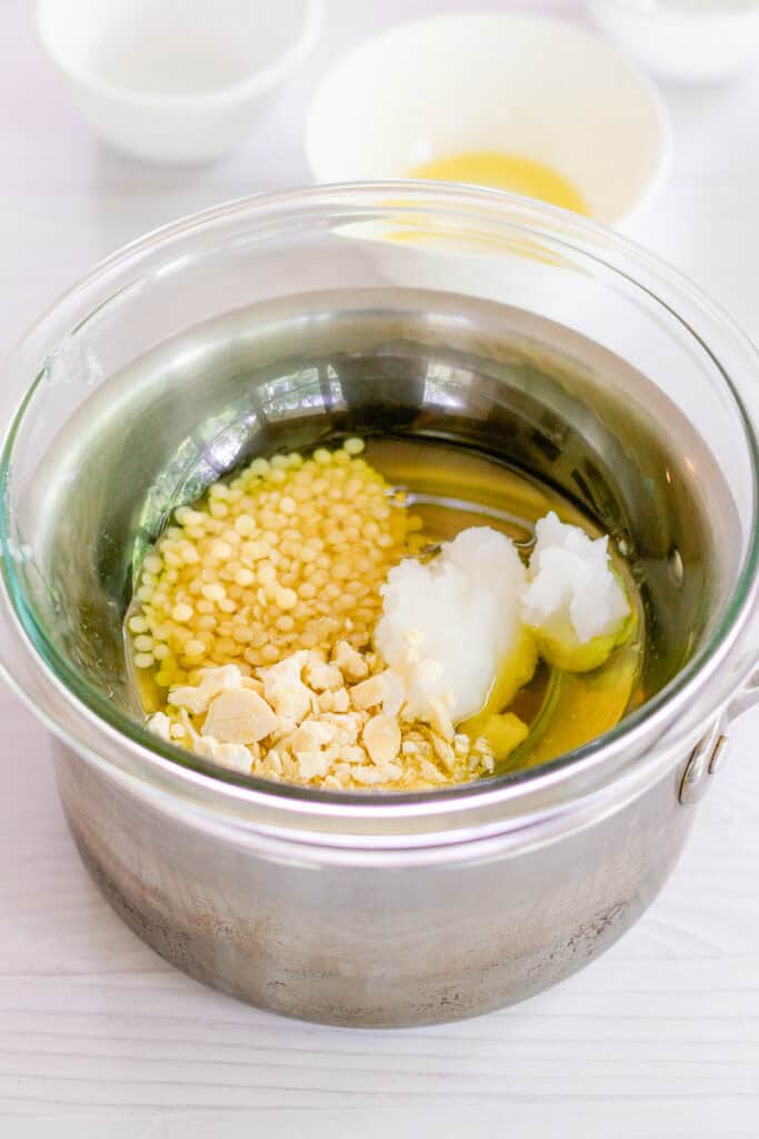 Melting the ingredients for the sunscreen in a double boiler. 