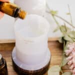 Adding different essential oils to the diffuser reservoir.