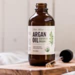 Bottle of Morrocan argan oil with a dropper top.
