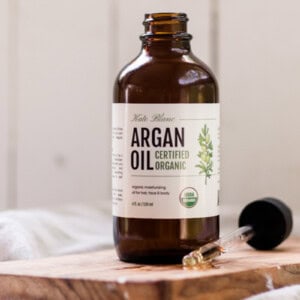 Bottle of Morrocan argan oil with a dropper top.