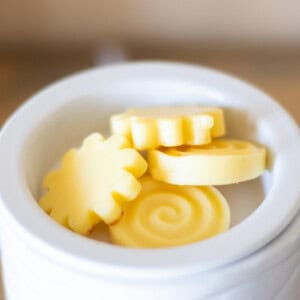Homemade wax melts in a white electric wax warmer.