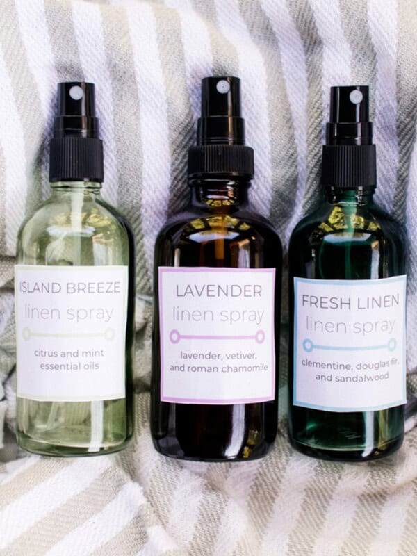 3 homemade linen sprays with labels.