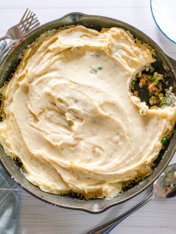 Looking down on a gluten-free shepherd's pie in a cast iron skillet.