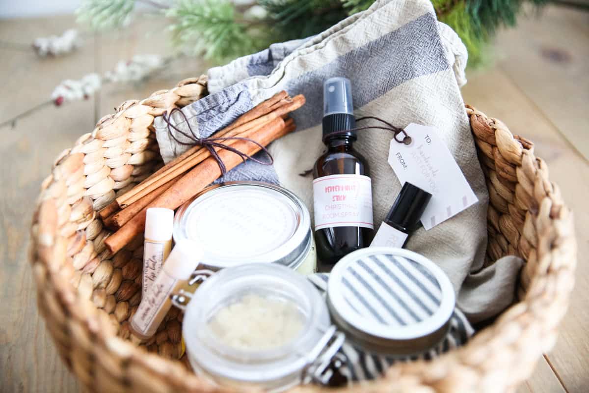 A homemade Christmas gift basket with bath and beauty products in it.