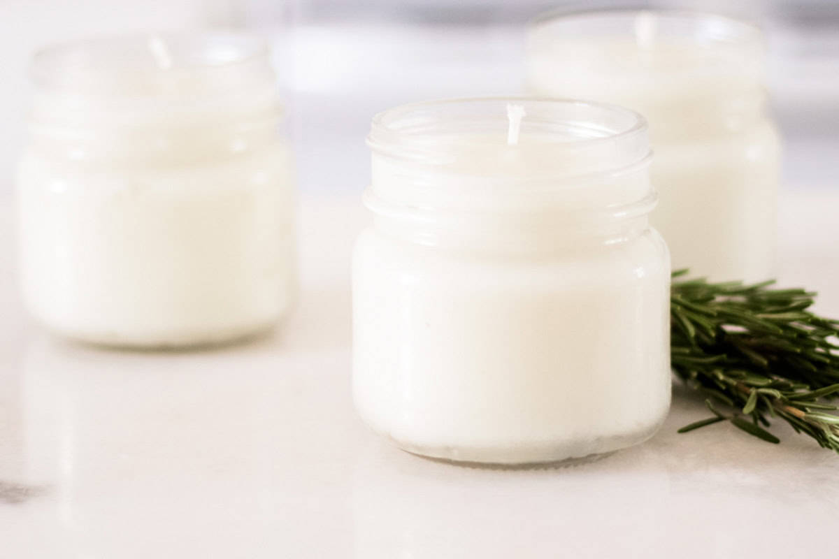 Three rosemary mint soy candles.