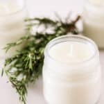 Rosemary mint soy candles and evergreen cuttings.