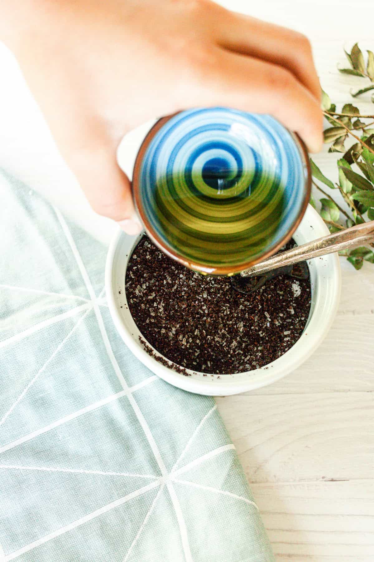 Add in the jojoba oil and essential oils.