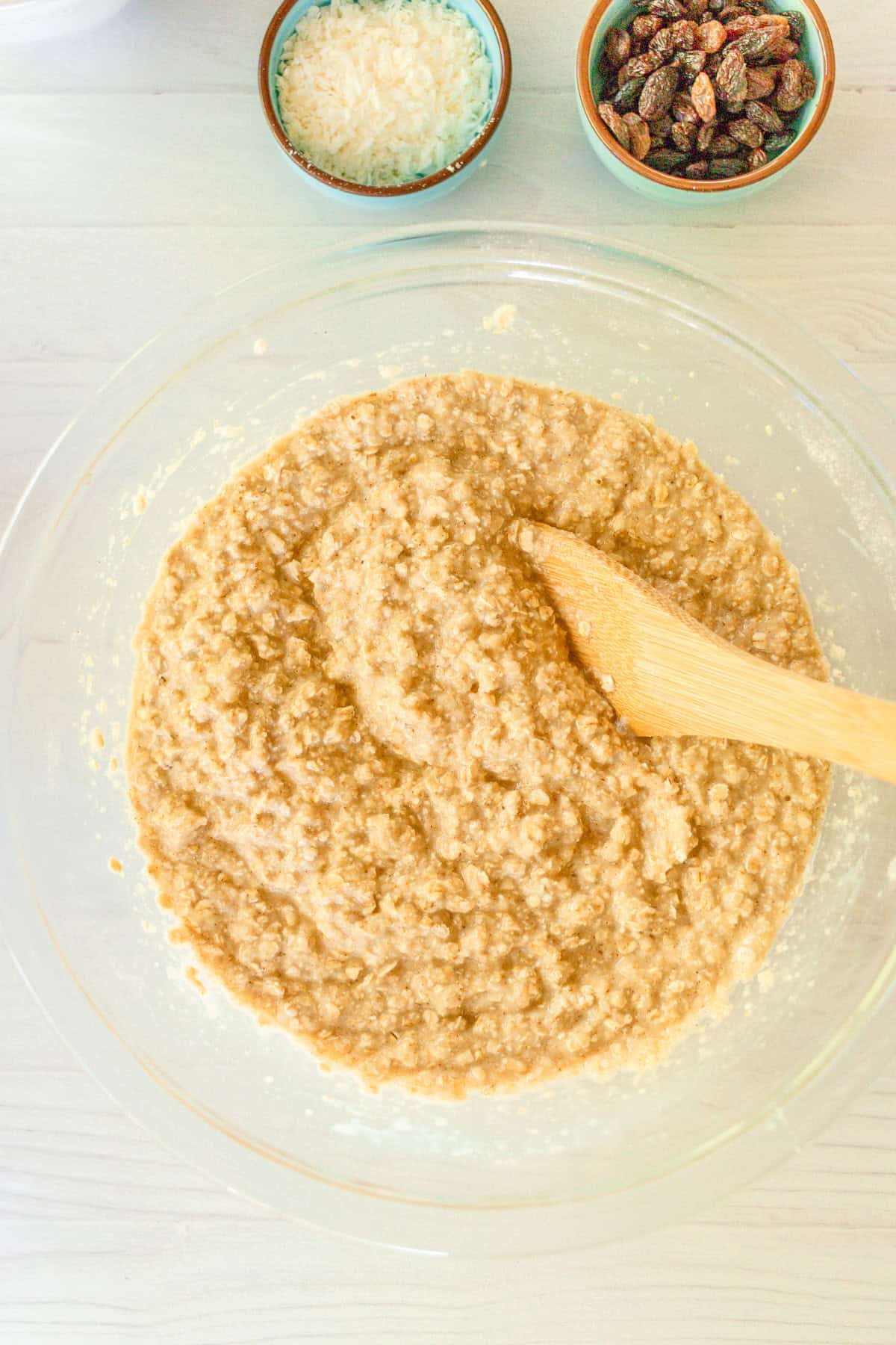 Stirring together the applesauce, coconut milk, vanilla, and coconut oil.