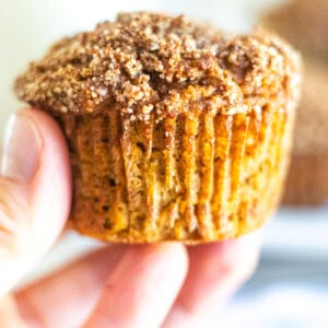 Homemade pumpkin muffin with cinnamon crumble.