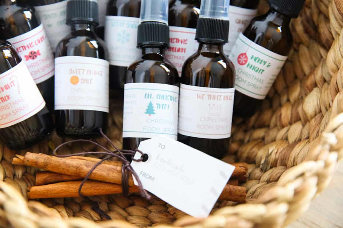 A basket of holiday room spray bottles.