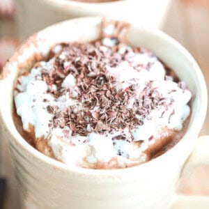Paleo peppermint hot chocolate in a beige mug.