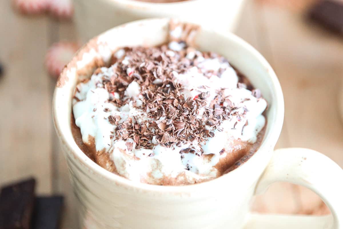 Paleo peppermint hot chocolate in a beige mug.