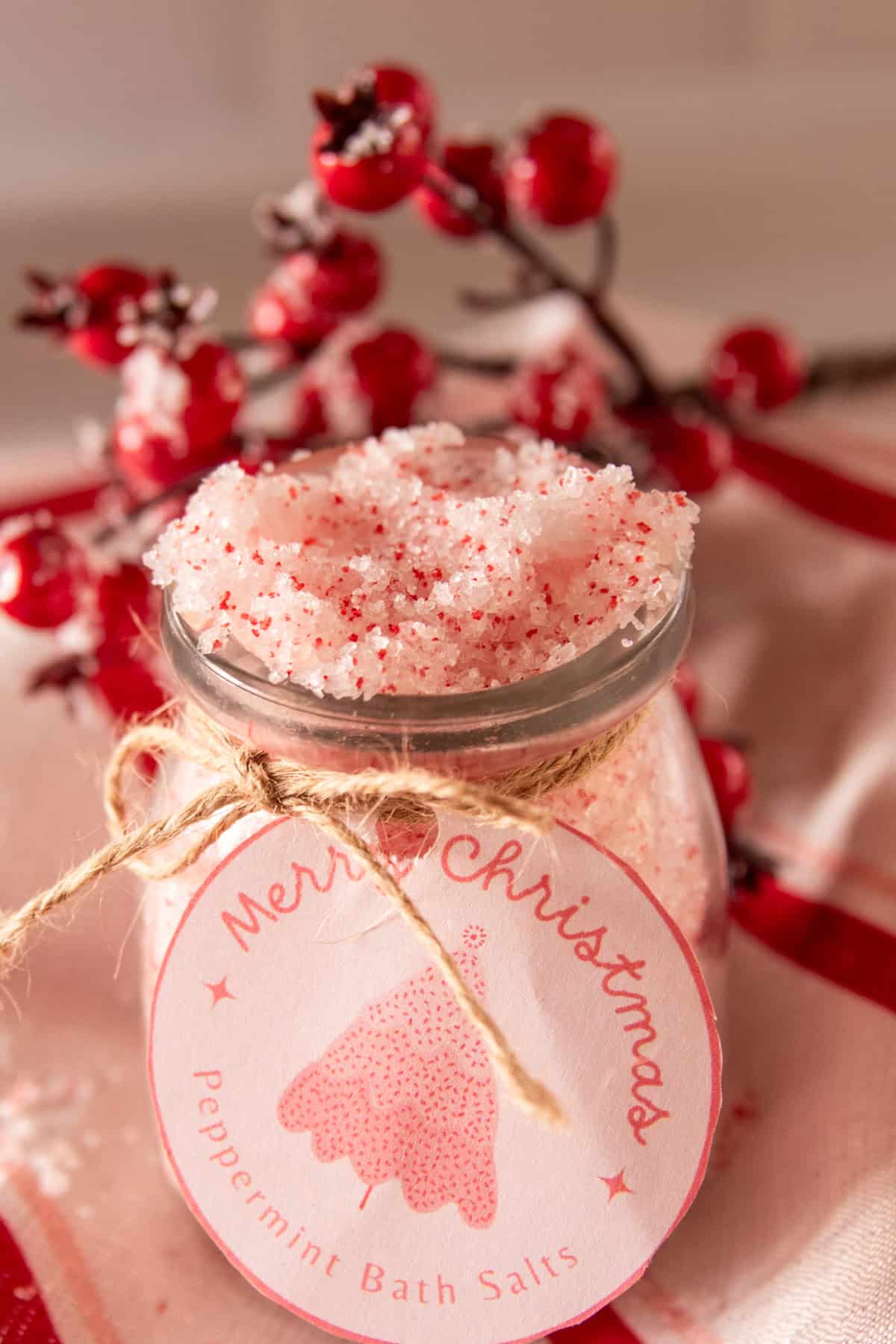 Peppermint bath salts in a jar with a Christmas label.