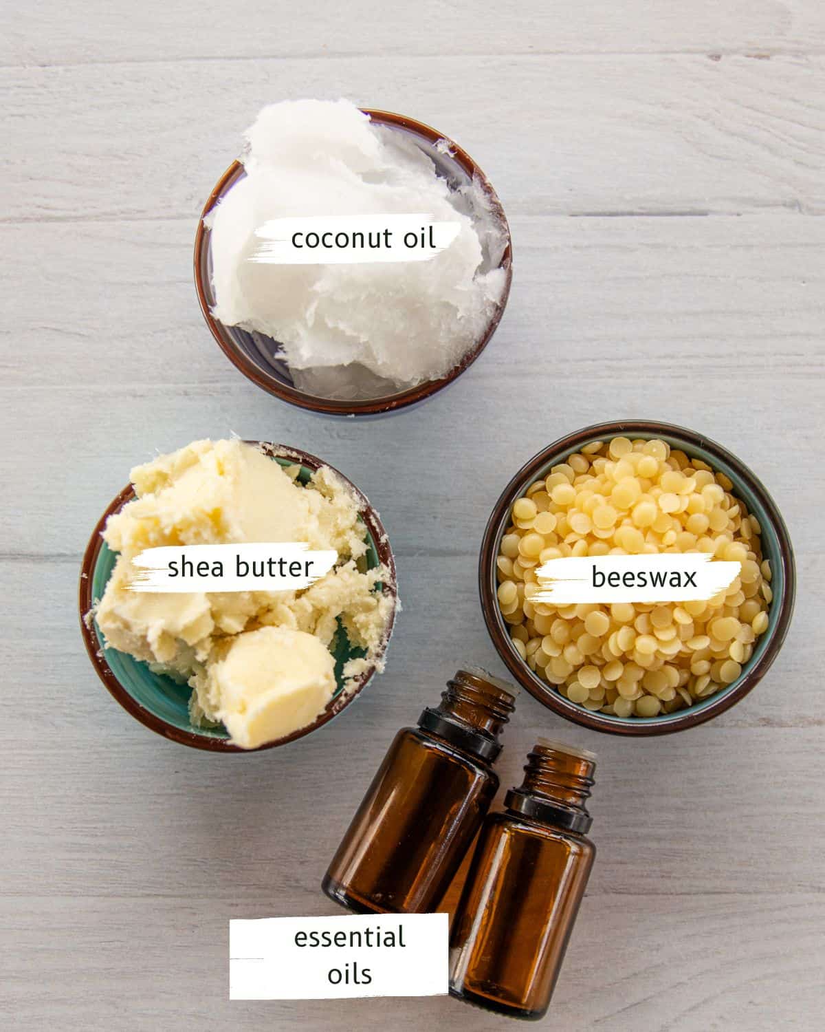 Homemade muscle rub ingredients on a white background.