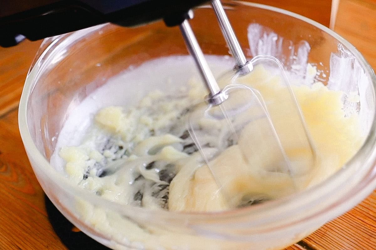 Whipping tallow balm with a hand mixer.