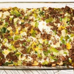 A sweet potato breakfast casseroles in a glass baking dish.