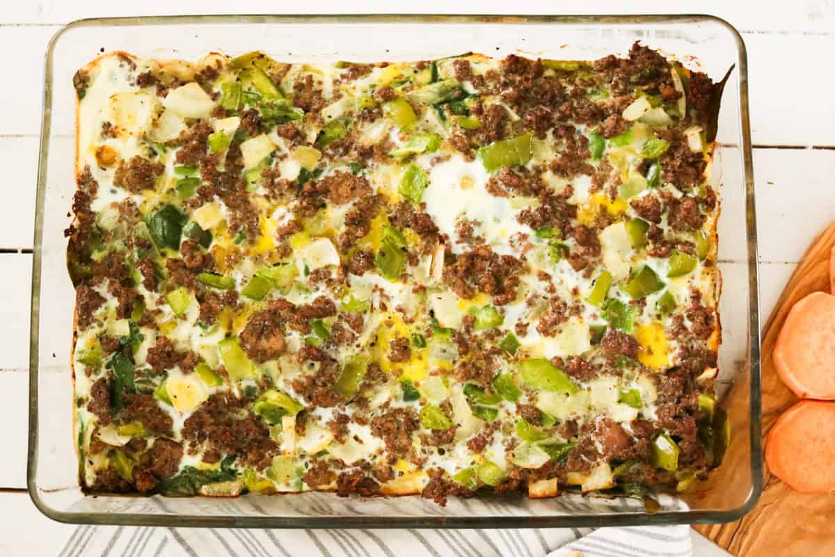 A sweet potato breakfast casseroles in a glass baking dish.