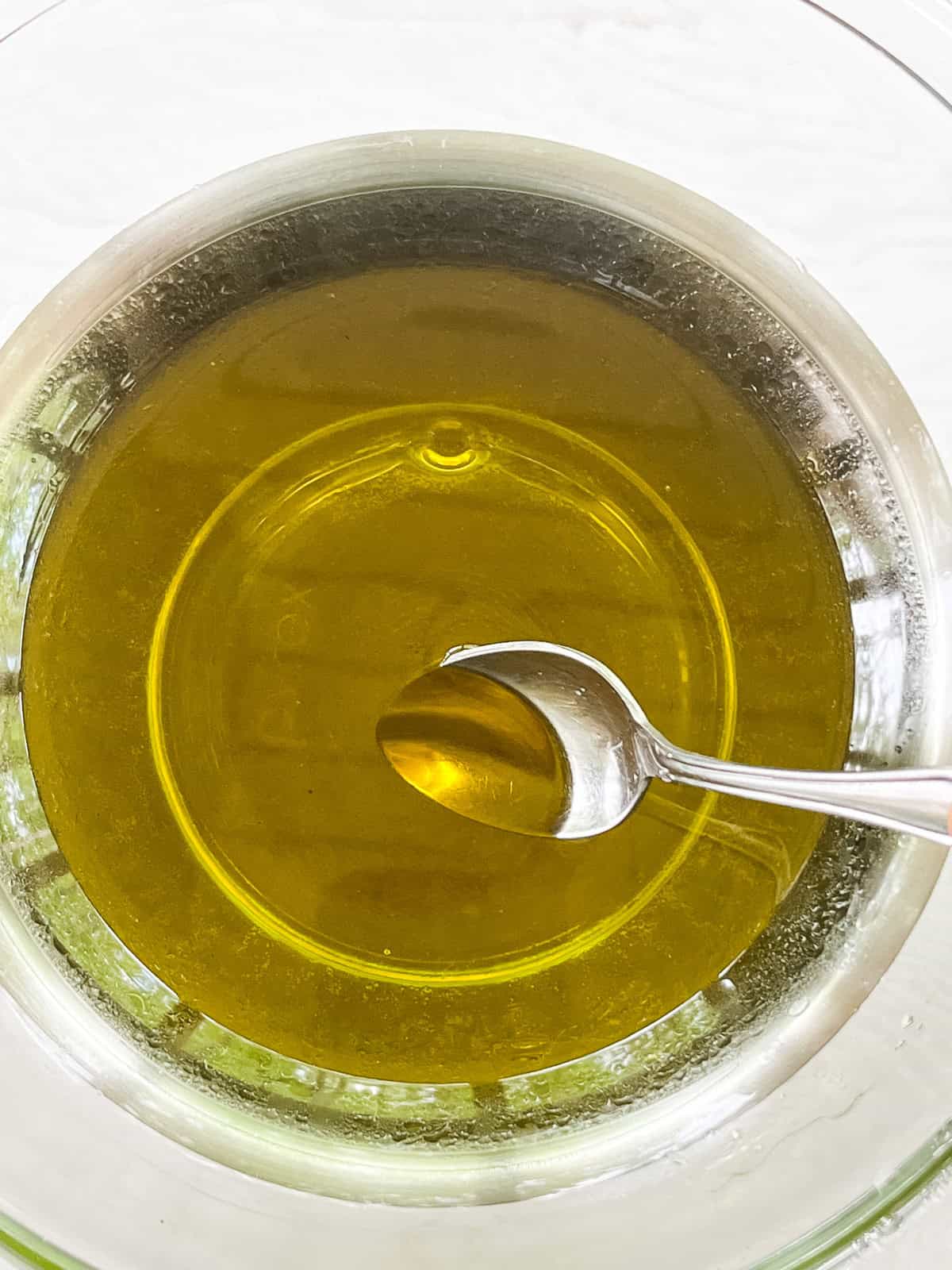Mixing salve ingredients in a bowl.