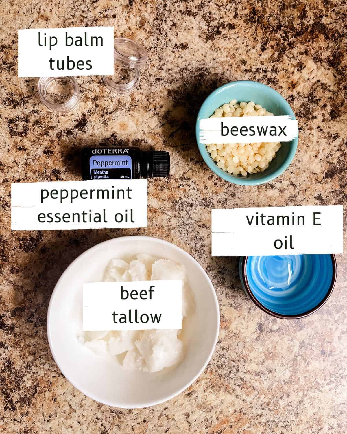 Tallow lip balm ingredients assembled and labeled.
