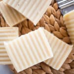 Beeswax soap bars on a wicker mat.