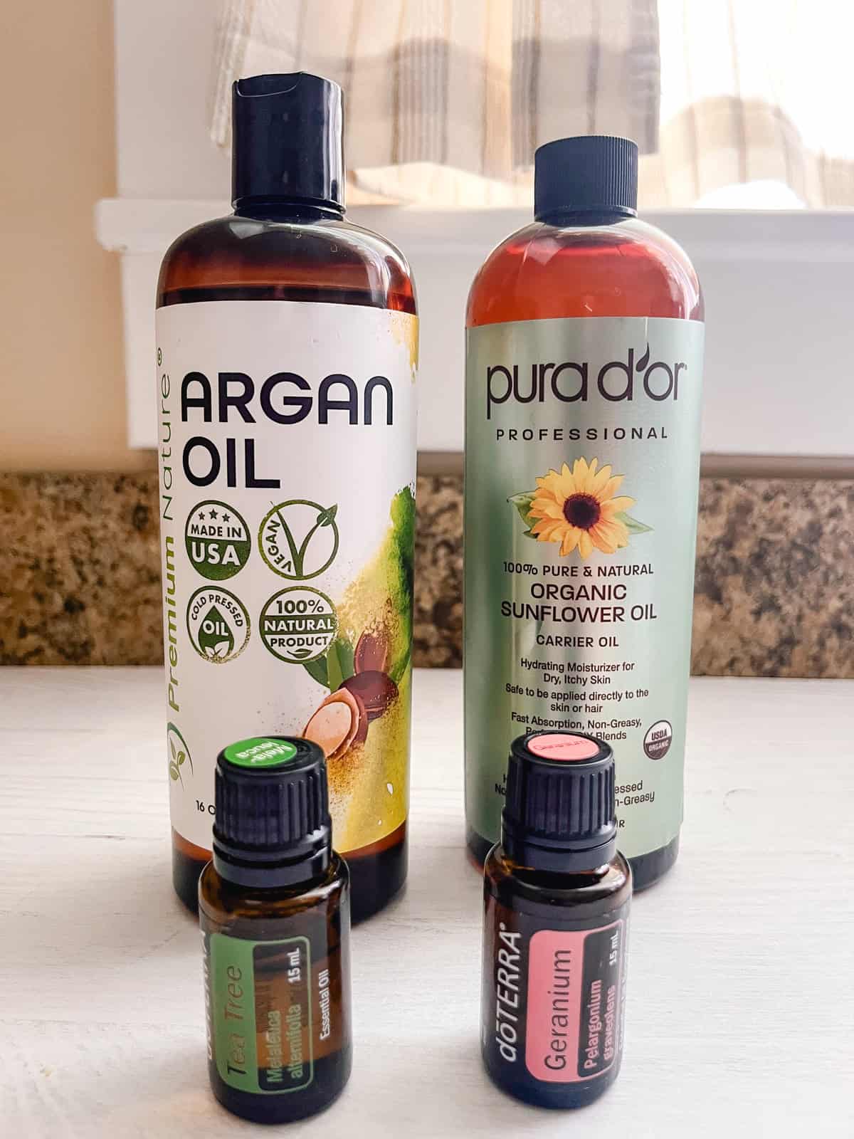 DIY cuticle oil ingredients assembled on a counter.