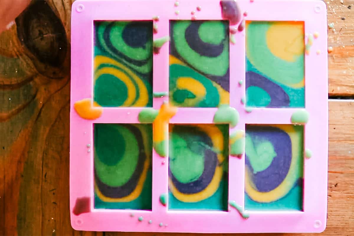 Colorful swirly soap in a silicone soap mold. 