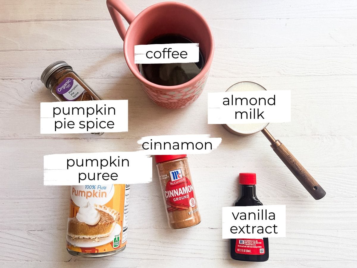 Whole30 pumpkin spice latte ingredients labeled on a white table.